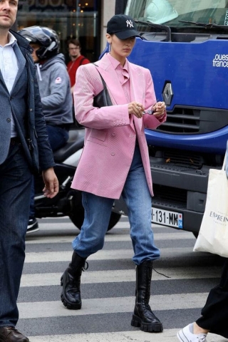 Combat high boots are powerful accessory helping Bella Hadid elevate outfit