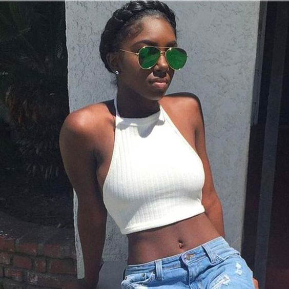 Combine overall-style crop top and jeans