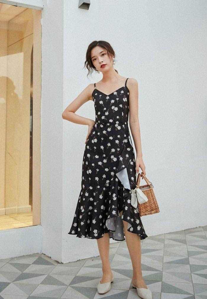 Very cute black two-strap dress with small floral pattern