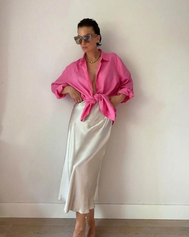 Extremely attractive beach outfit with pink shirt and silk skirt