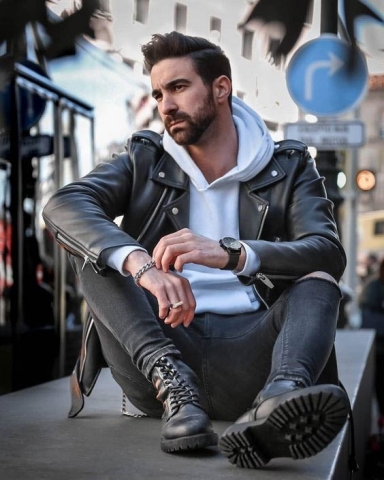 Men's hoodie outfit styling with leather jacket