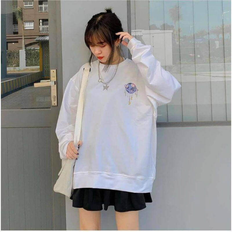 Pair sweater with short skirt
