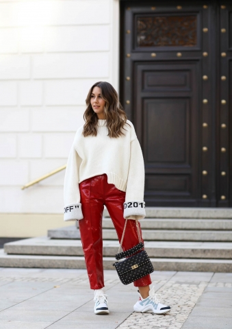 Red pants with oversized sweater