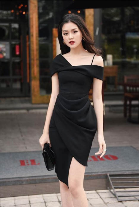 Runner-up Tuong San attractive in black off-shoulder dress design