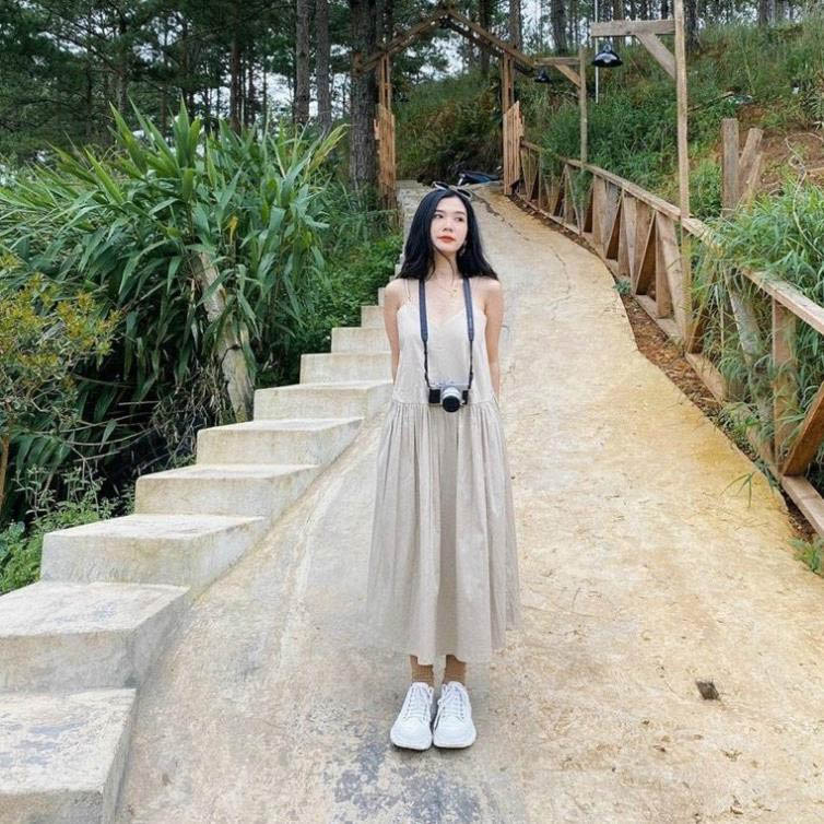 Simple cream-colored two-strap dress for trips
