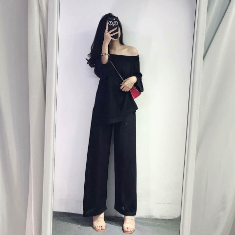 What color top should pair with black pants