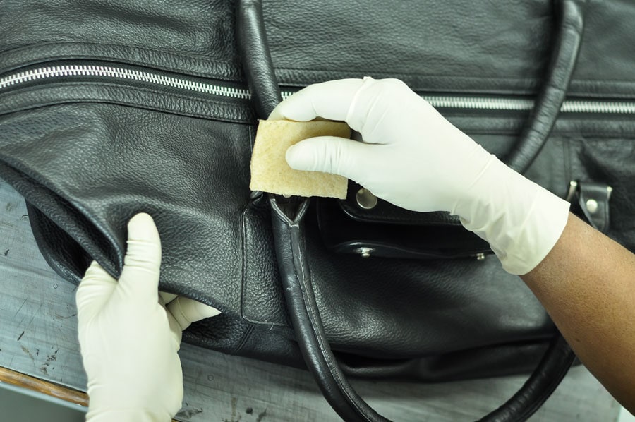 How to clean and preserve a leather bag with warm water